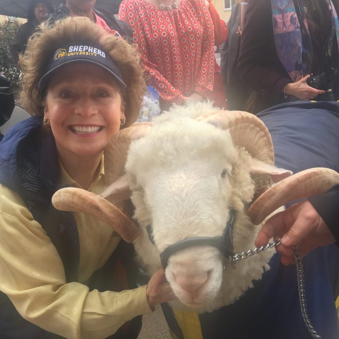 President and J.C. Shepherd's president poses with J.C. the Ram