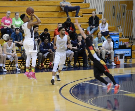Steffen Davis pulls up from beyond the arch in a game against Wheeling Jesuit