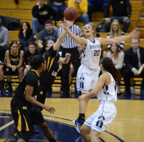 Liz Myers battles Hilltoppers for rebound 