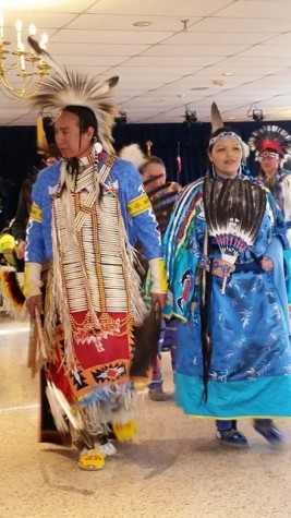  The male and female lead dancers, adorned in full traditional regalia. It is considered disrespectful to refer to such clothes as costumes.