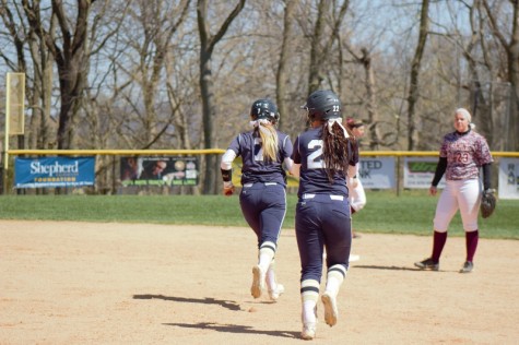 Rachel Taylor rounding the bases after her home run over center field against Fairmont State 